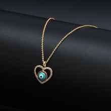 Load image into Gallery viewer, Blue and White Stone Studded Heart Shaped Evil Eye Pendant Necklace - Jewellery