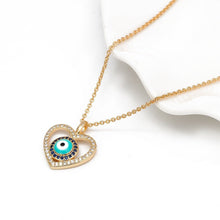 Load image into Gallery viewer, Blue and White Stone Studded Heart Shaped Evil Eye Pendant Necklace - Jewellery
