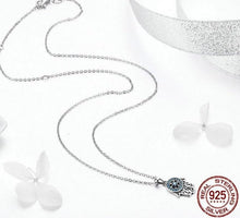 Load image into Gallery viewer, Blue Stone Studded Hamsa Hand Evil Eye Silver Necklace - Necklace