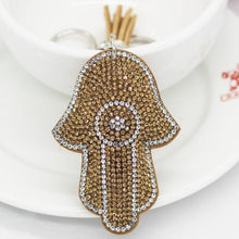 Load image into Gallery viewer, Brown Stone Studded Hamsa Hand with Evil Eye Keychain - Keychain