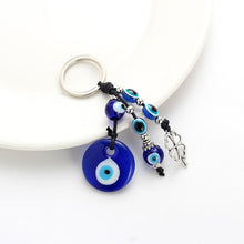 Load image into Gallery viewer, Deep Blue Evil Eye Keychains - 10 Designs - KeychainEvil Eye with Four Leaf CloverBlue