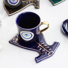 Load image into Gallery viewer, Evil Eye, Hamsa Hand and Mermaid's Tail themed Cup and Saucer Sets - Cup and Saucer SetWhiteCircular DesignHamsa Hand