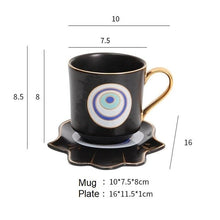 Load image into Gallery viewer, Evil Eye, Hamsa Hand and Mermaid's Tail themed Cup and Saucer Sets - Cup and Saucer SetBlackCircular DesignHamsa Hand