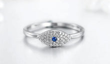 Load image into Gallery viewer, Image of an Evil Eye protection ring in a sparkling blue and white stone-studded eye-shaped Evil Eye