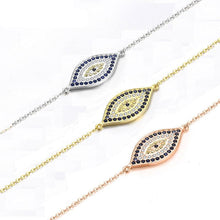 Load image into Gallery viewer, Image of three eye shaped Evil Eye necklaces in a beautiful and delicate, blue and white stone-studded eye-shaped Evil Eye