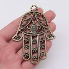 Load image into Gallery viewer, Hamsa Hand with Evil Eye Metal Wall Hangings - Wall HangingBronze
