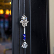 Load image into Gallery viewer, Hamsa Hand with Evil Eye Wall Hanging with Single Large Suncatcher Crystal - Wall Hanging