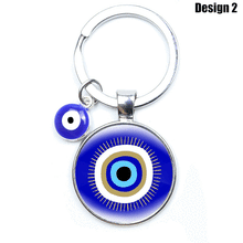 Load image into Gallery viewer, Metallic Dual Evil Eye Keychains - 10 Designs - KeychainDesign 2