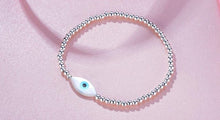 Load image into Gallery viewer, Mother of Pearl White Evil Eye Silver Beaded Bracelets - BraceletHoly Cross