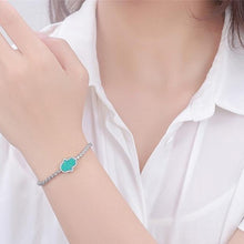 Load image into Gallery viewer, Radiant Blue Hamsa Hand Silver Bracelet - Bracelet