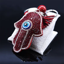Load image into Gallery viewer, Red Stone Studded Hamsa Hand with Blue Evil Eye Keychain - Keychain
