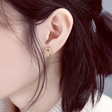 Load image into Gallery viewer, White Stone Hamsa Hand with Evil Eye Stud Earrings - EarringsGold