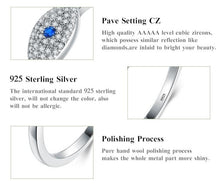 Load image into Gallery viewer, Information detail image of sterling silver Evil Eye ring in a sparkling blue and white stone-studded eye-shaped Evil Eye

