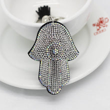 Load image into Gallery viewer, White Stone Studded Hamsa Hand with Evil Eye Keychain - Keychain
